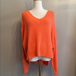 Vibrant Coral V-Neck Sweater for Women